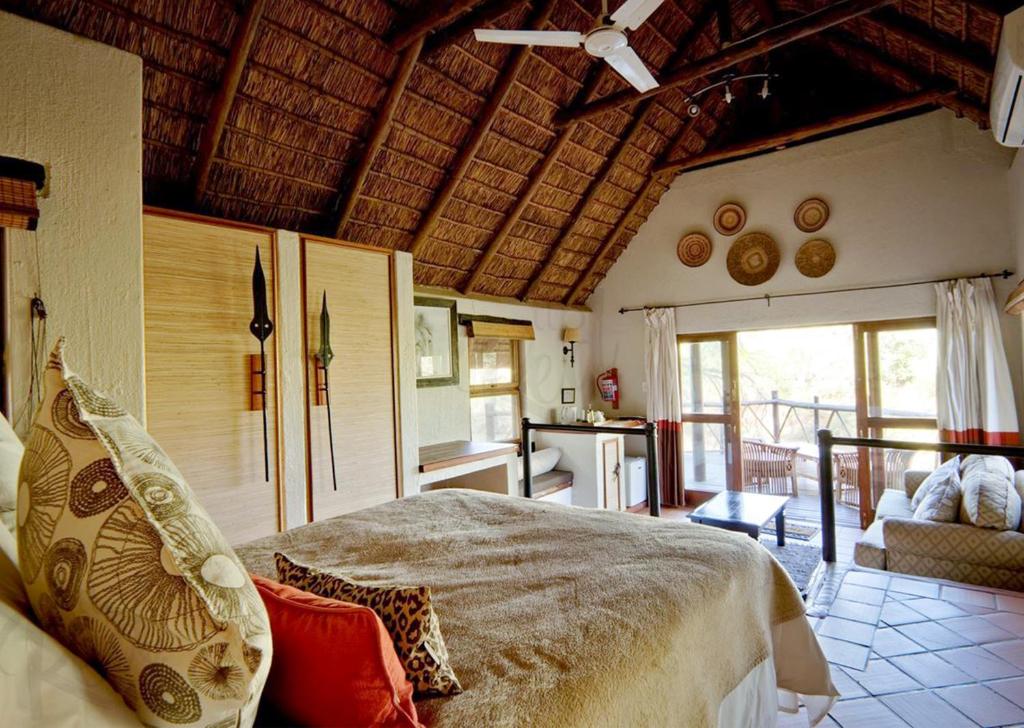 madikwe river lodge bedroom