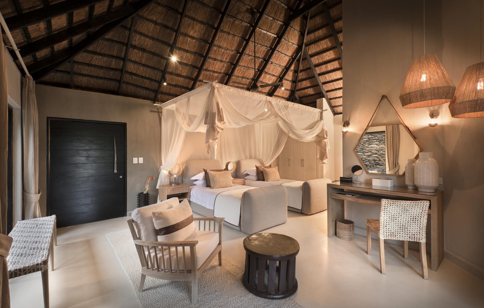 lion sands river lodge luxury suite twin bedroom setup
